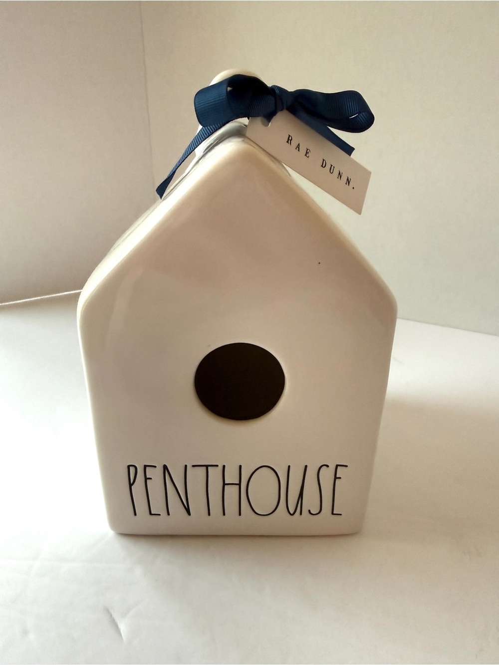 Rae Dunn Cream Ceramic 'PENTHOUSE' Birdhouse with Navy Bow